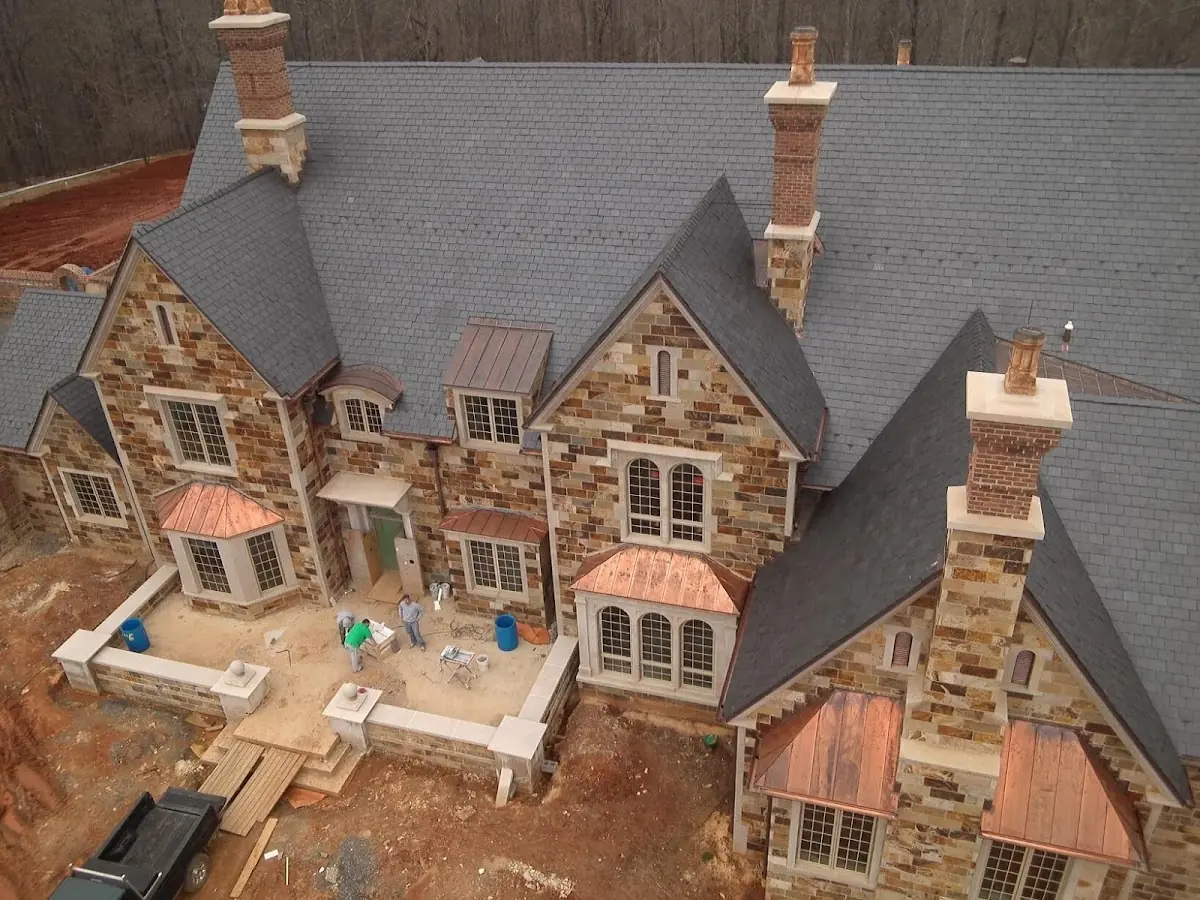 Craftsman Roofing Gutter Guard Installation project in Lambs